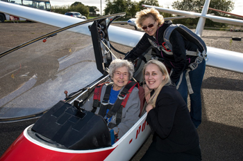 99-Year-Old Olwyn Hopkins with Lifestyle Coordinater Katie Ramsbotham  Pilot Liz Russell.